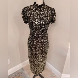 Never worn! Sophisticated, Flattering and Sexy Gold sequin cocktail dress!